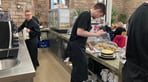 Behind the counter Ryan and Harry.jpg