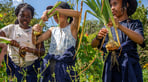 Children with plants crop.jpg