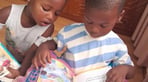 girl and boy reading.jpg