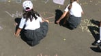 Girls chalking playground.jpeg