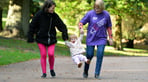 Home Start volunteer - walk with mum and child.jpg