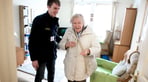 lady-in-care-setting-with-young-carer.jpg