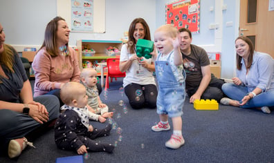 babies_and_parents_group_bubbles_communicatehires_120mb_2022_07_26_11_24_27_am