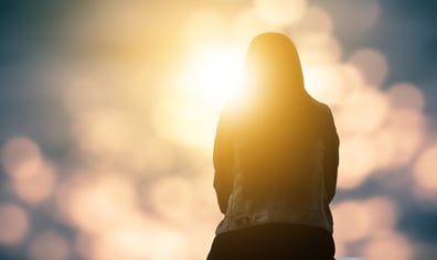 Woman sitting in sun