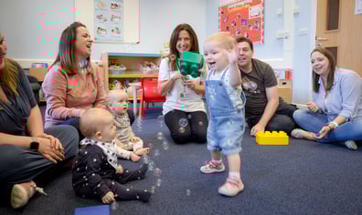 babies_and_parents_group_bubbles_communicatehires_120mb_2022_07_26_11_24_27_am