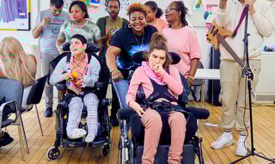 C14_Support-worker-and-service-user-at-Day-Opportunities-enjoying-music-session-together