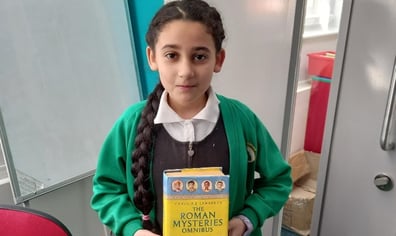 Forest Fields Primary and Nursery School - student holding a book