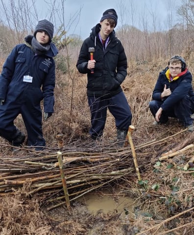 AirS - boys in woods