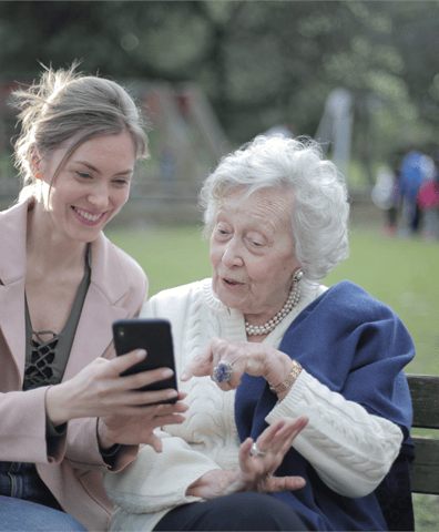 canva_cheerful_senior_mother_and_adult_daughter_using_smartphone_together_2022_04_06_12_25_47_pm