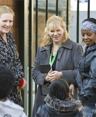 practitioner_outside_school_gate_2022_06_06_11_49_56_am