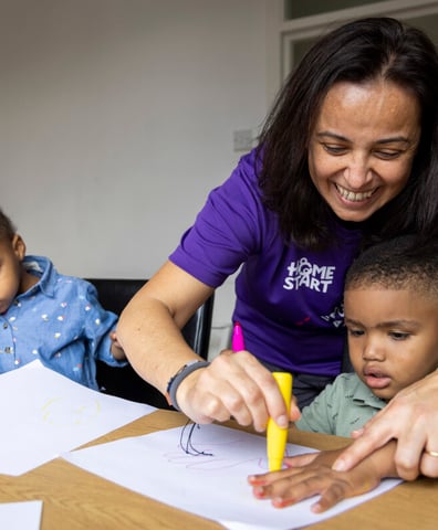volunteer_drawing_with_children_2023_09_08_08_42_59_am