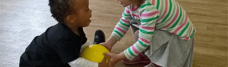 group_girl_and_boy_sitting_on_hall_floor_cropped_2021_03_25_05_50_34_pm
