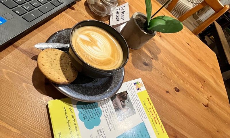 Coffee and leaflet