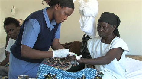 Woman with HIV AIDS in a ward in Kenya